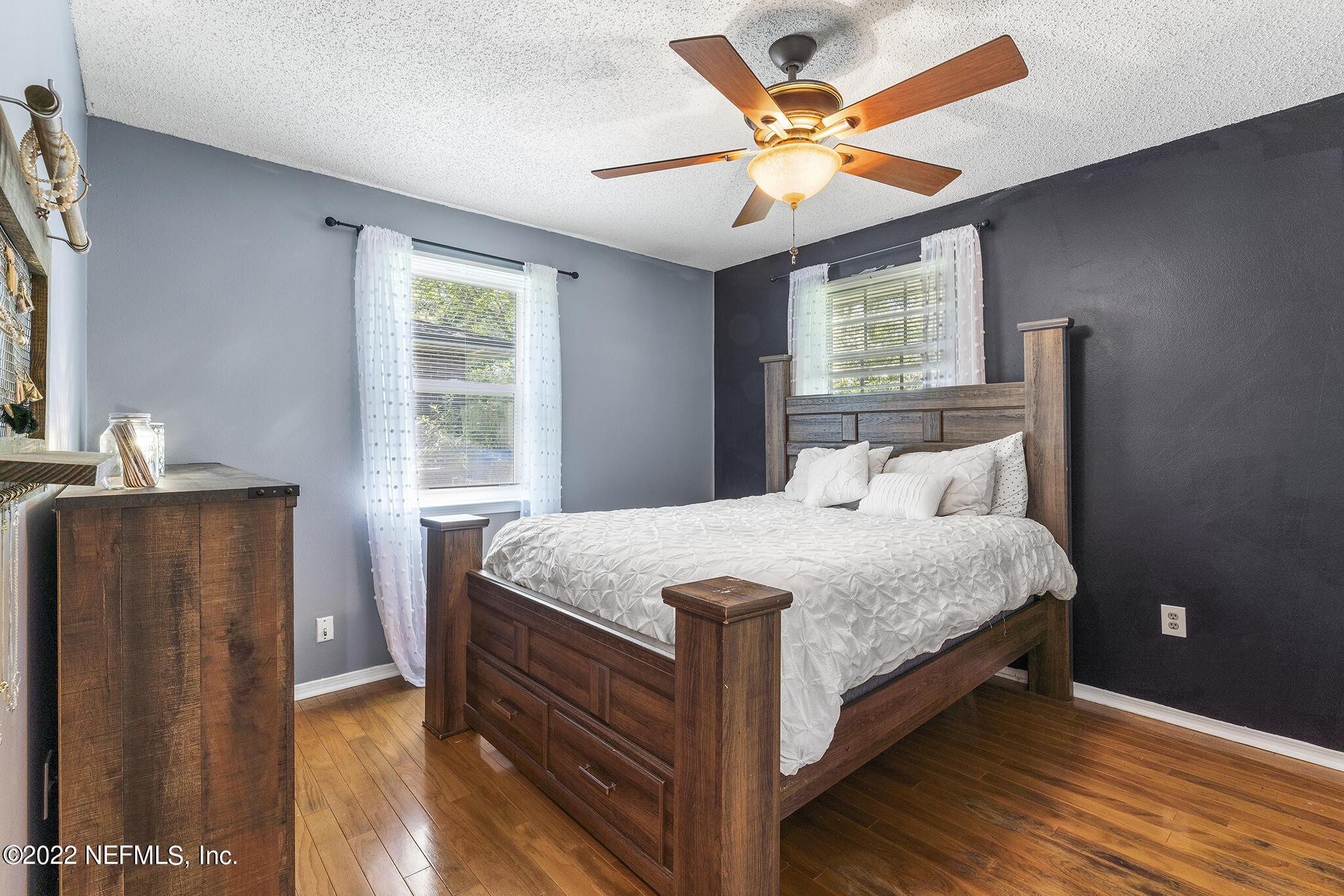 648 West Oliver Street Baldwin, FL 32234 - Photo 18 of 30 a bedroom with a bed and window