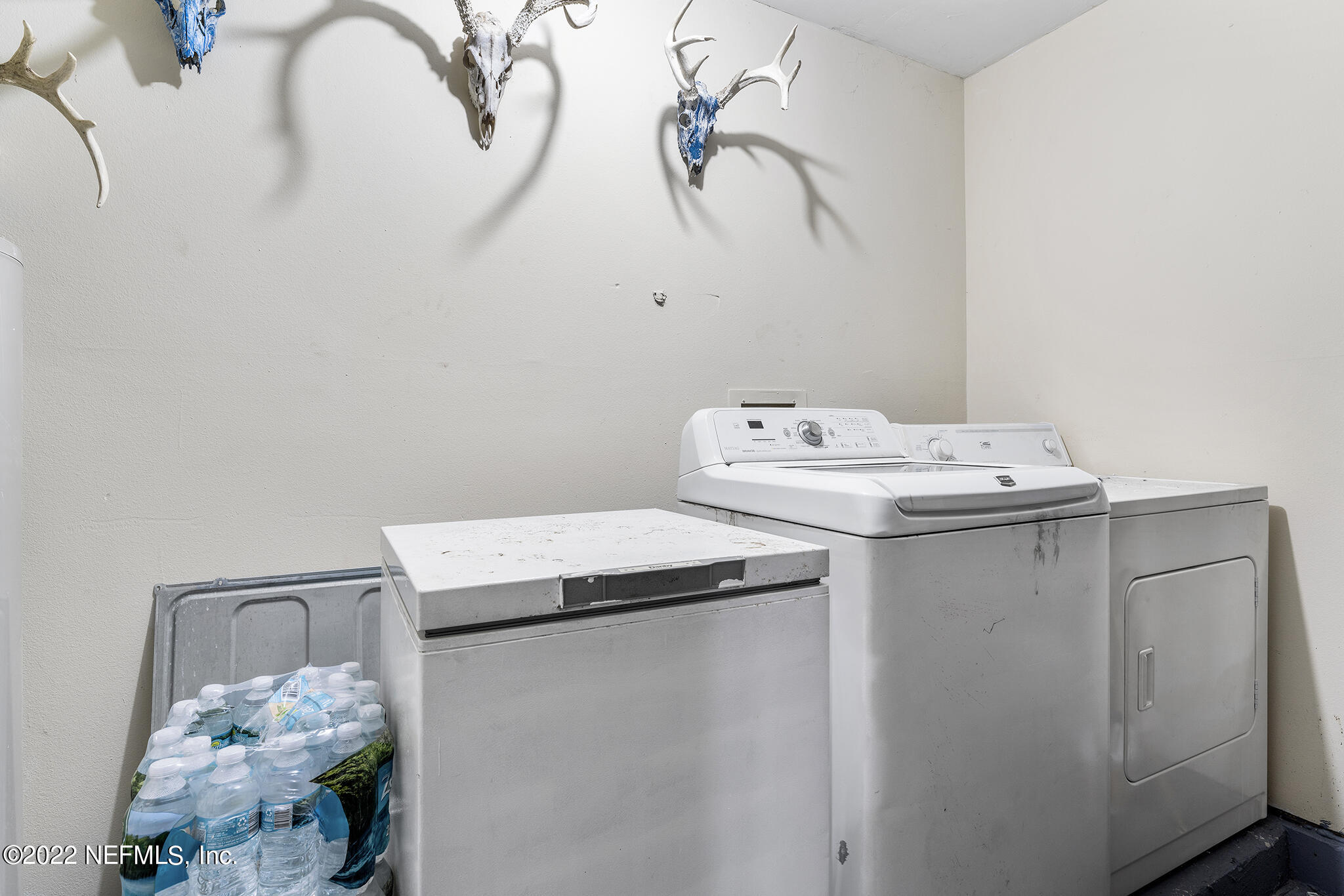 648 West Oliver Street Baldwin, FL 32234 - Photo 21 of 30 a utility room with dryer and washer