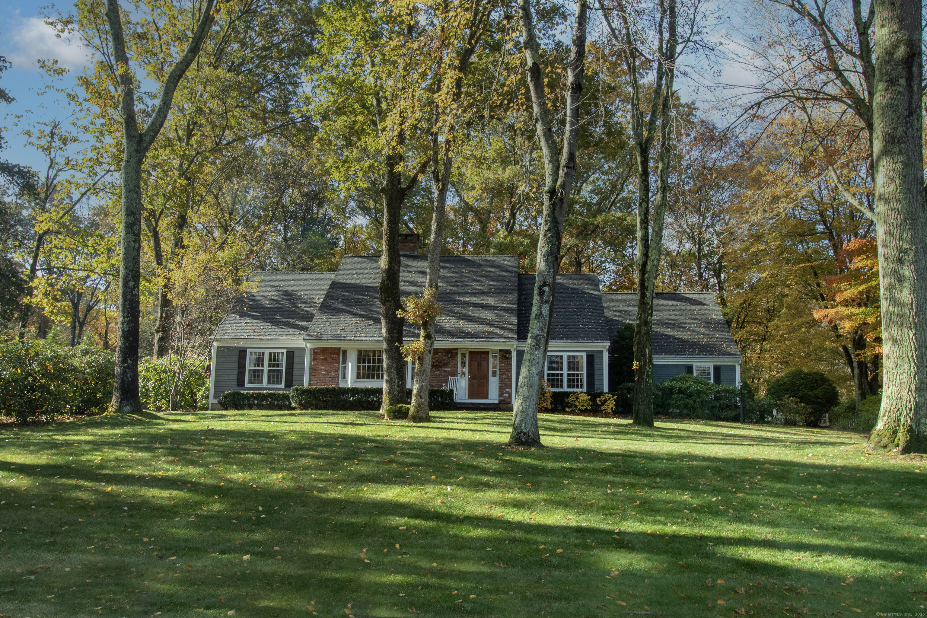 71 Madison Springs Drive Madison, CT 06443 - Photo 1 of 1 a front view of a house with a garden