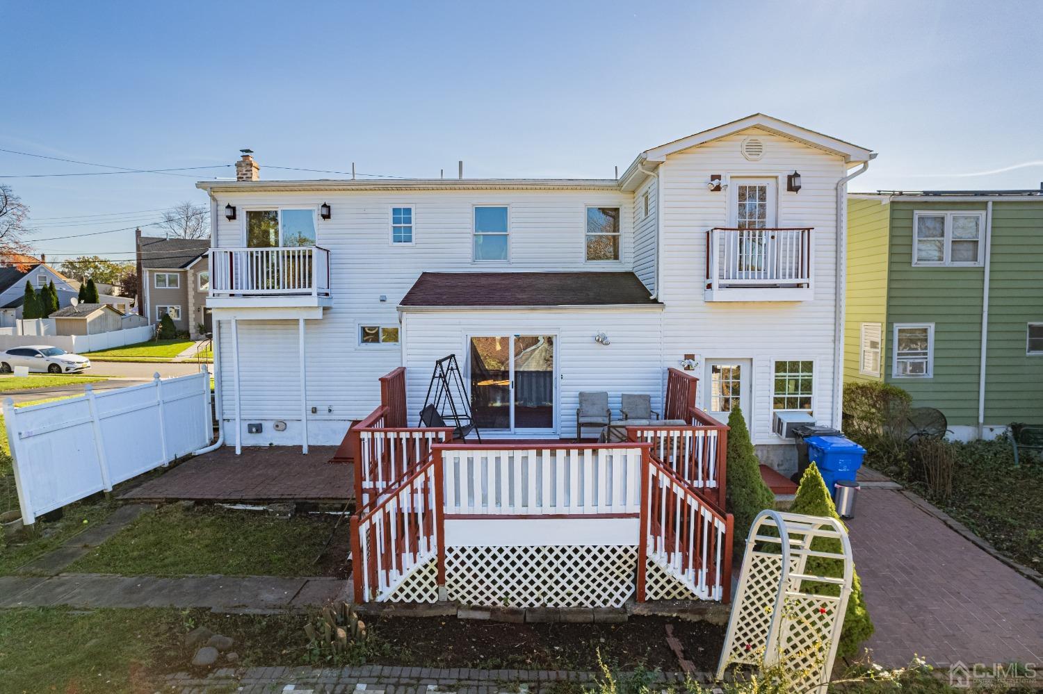 185 Midfield Road Colonia, NJ 07067 - Photo 25 of 27 a view of a house with a wooden deck