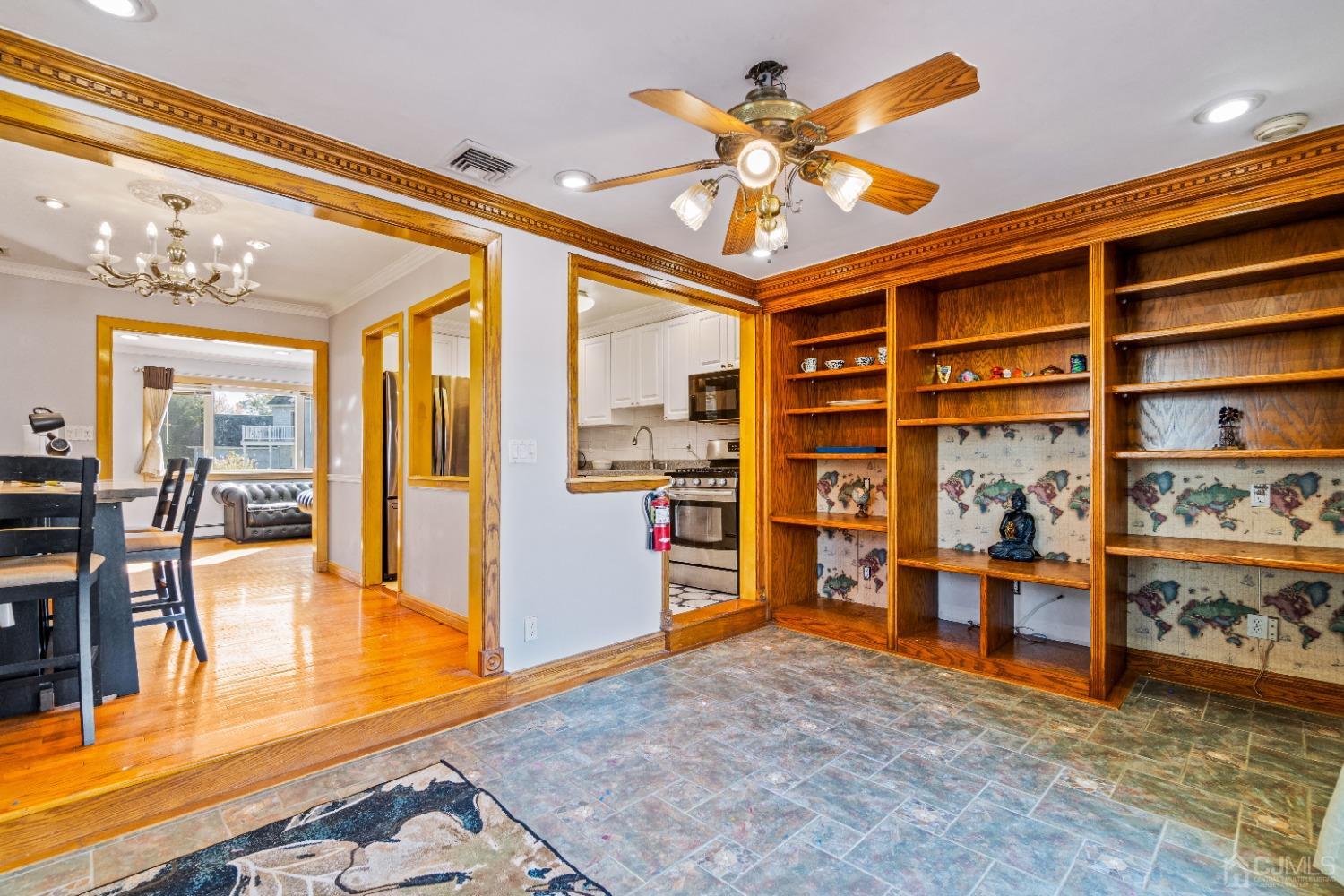 185 Midfield Road Colonia, NJ 07067 - Photo 5 of 27 a view of a livingroom with furniture and workspace