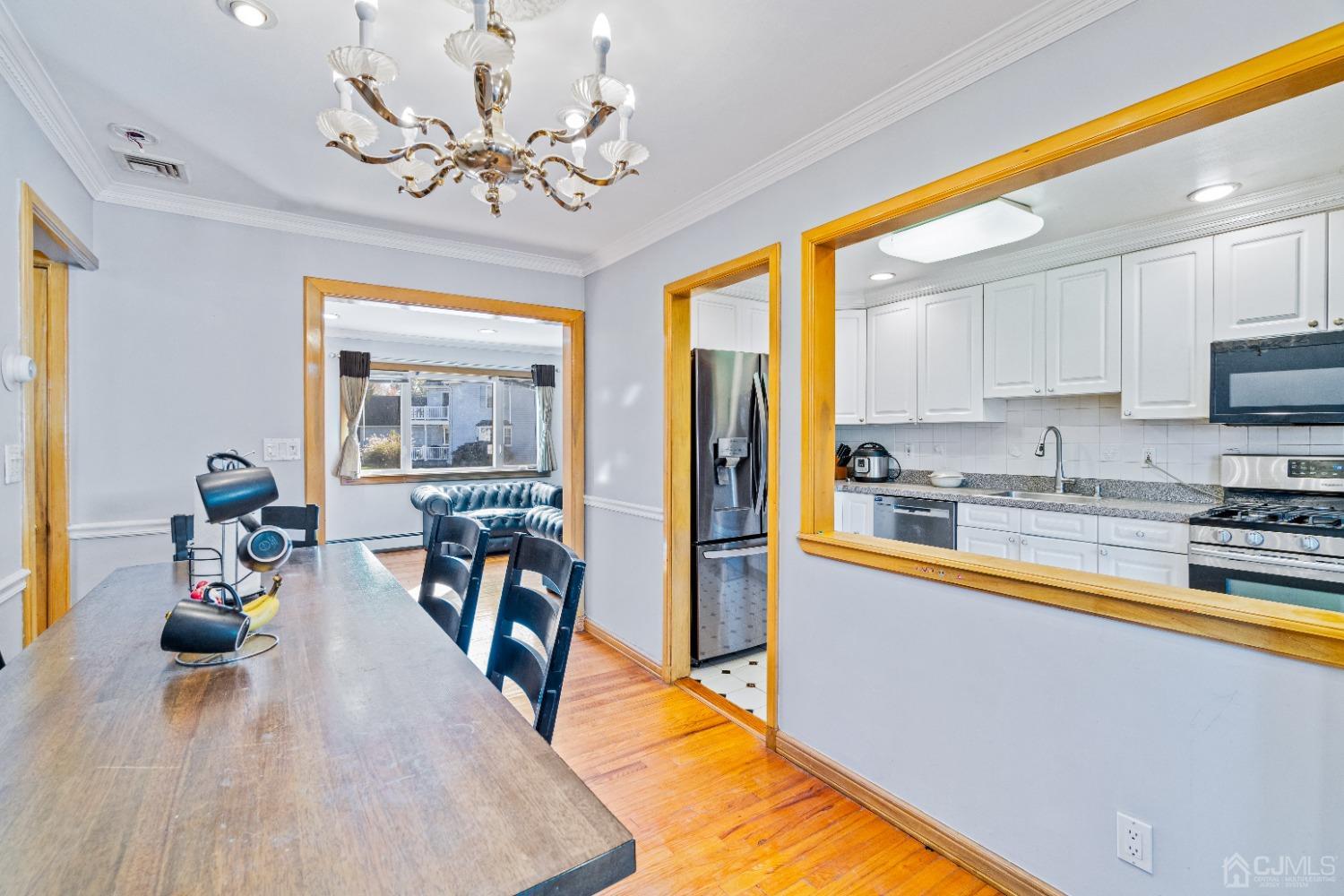 185 Midfield Road Colonia, NJ 07067 - Photo 10 of 27 a very nice looking kitchen with a large window