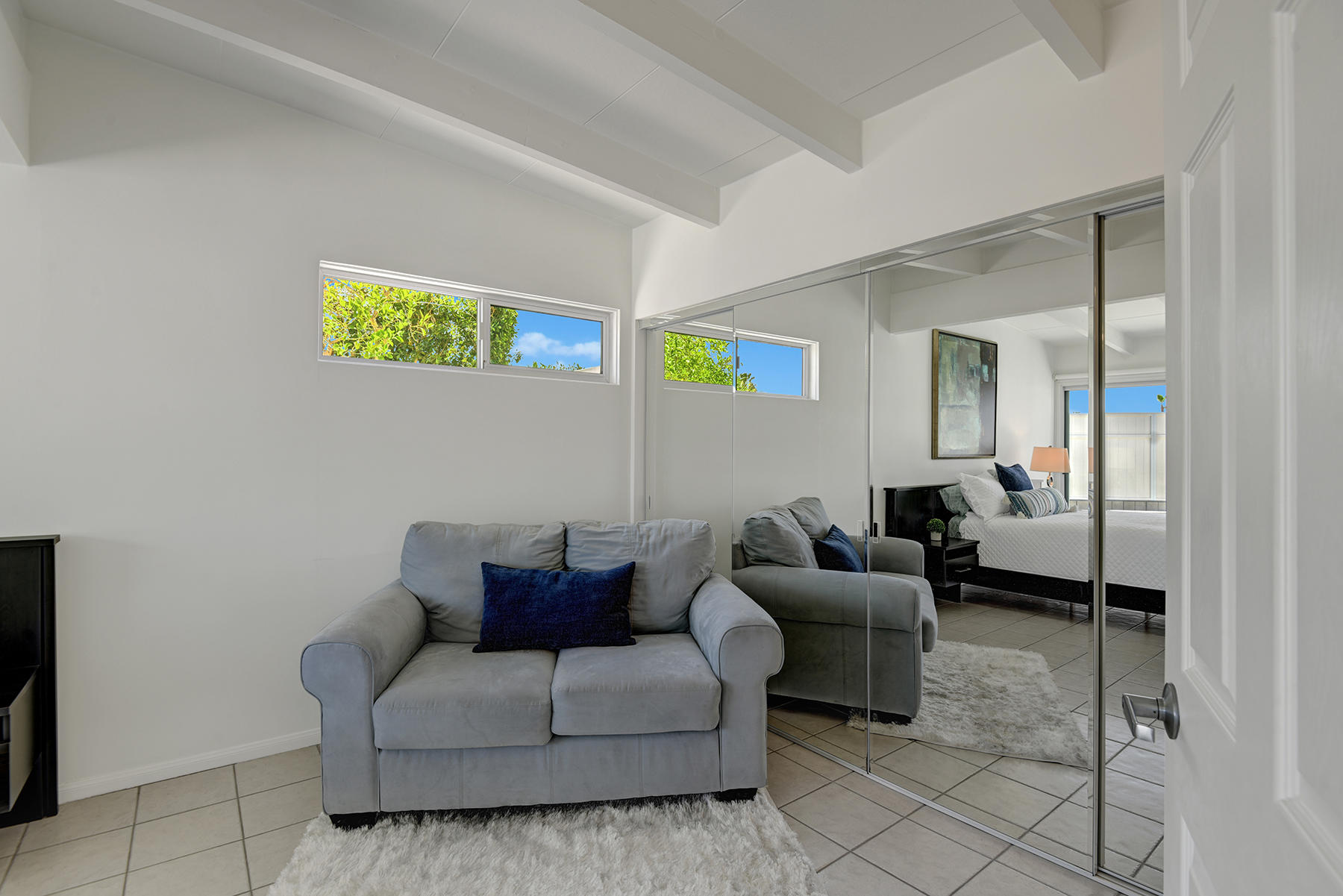 71704 Tunis Road Rancho Mirage, CA 92270 - Photo 20 of 47 a living room with furniture and a gate