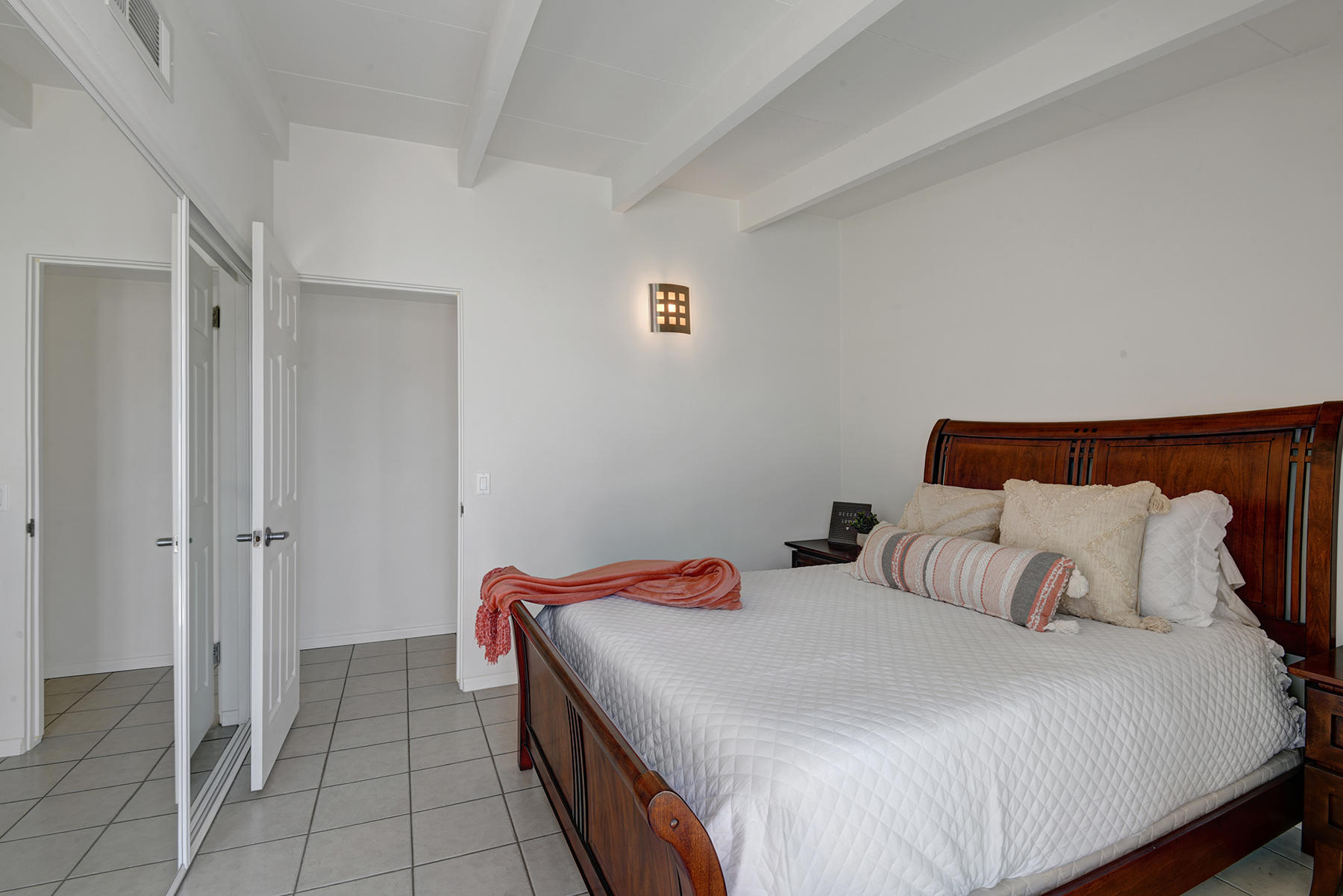 71704 Tunis Road Rancho Mirage, CA 92270 - Photo 24 of 47 a bedroom with a bed and a closet
