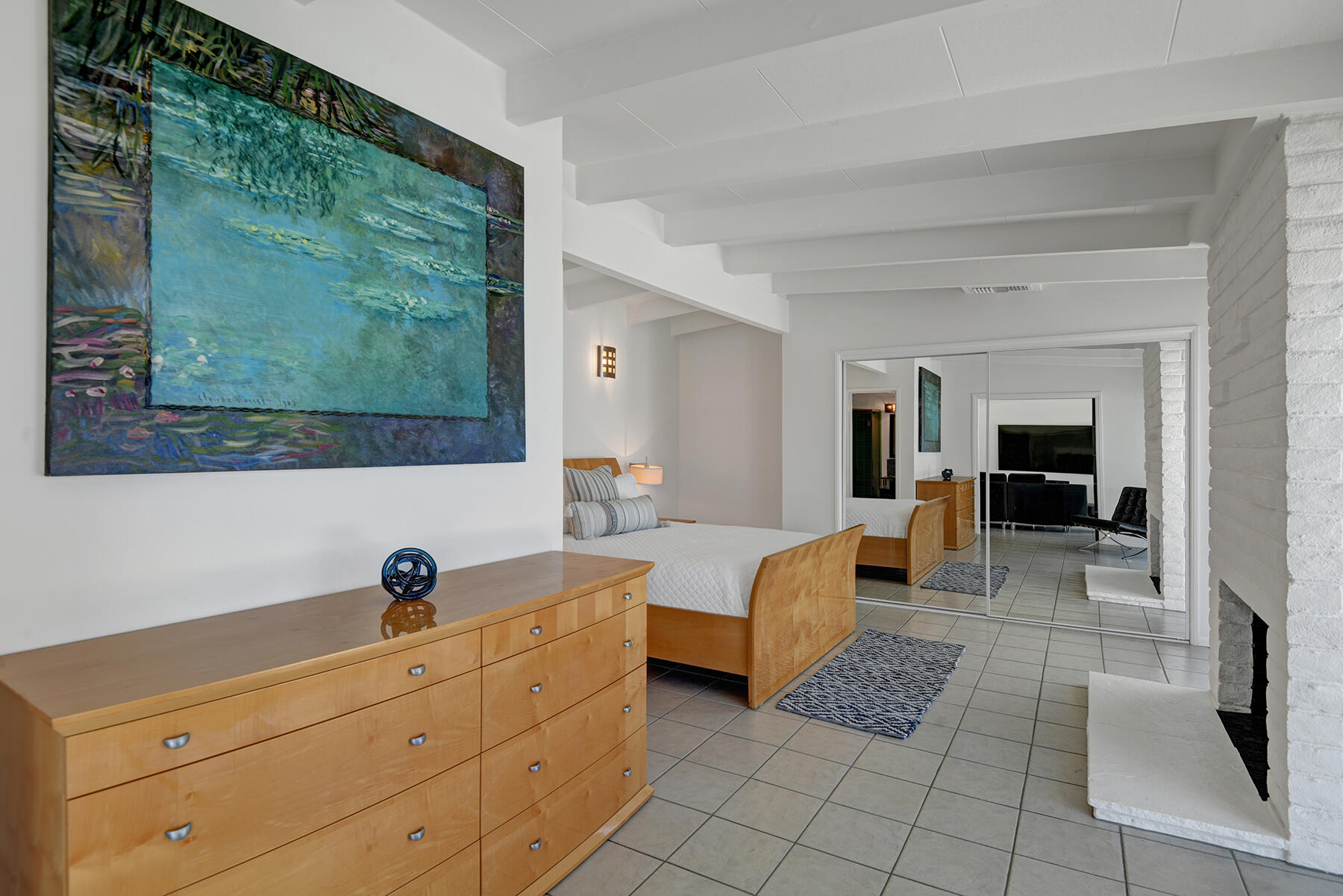 71704 Tunis Road Rancho Mirage, CA 92270 - Photo 30 of 47 a living room with furniture and a flat screen tv