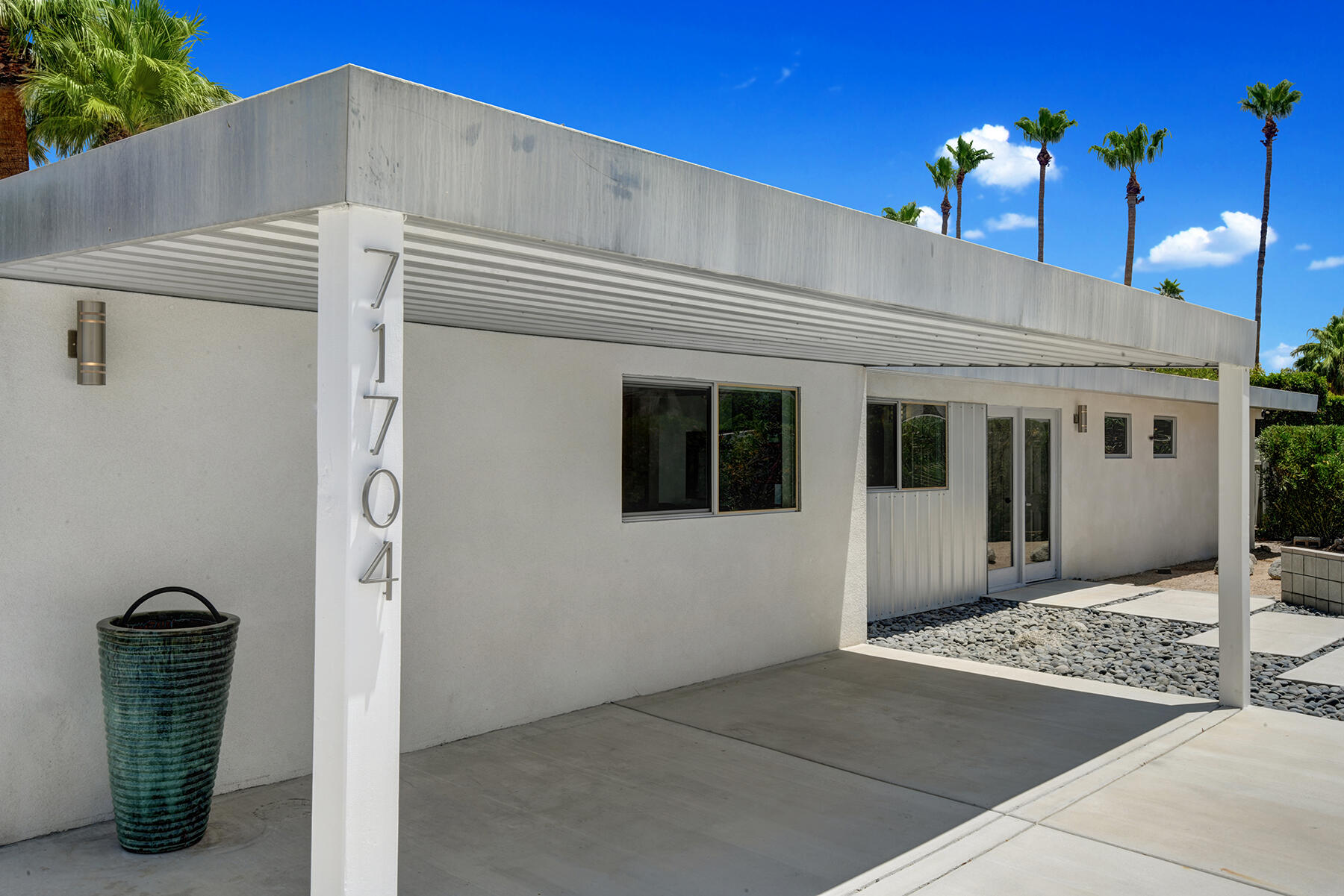71704 Tunis Road Rancho Mirage, CA 92270 - Photo 36 of 47 a view of a house with a potted plant