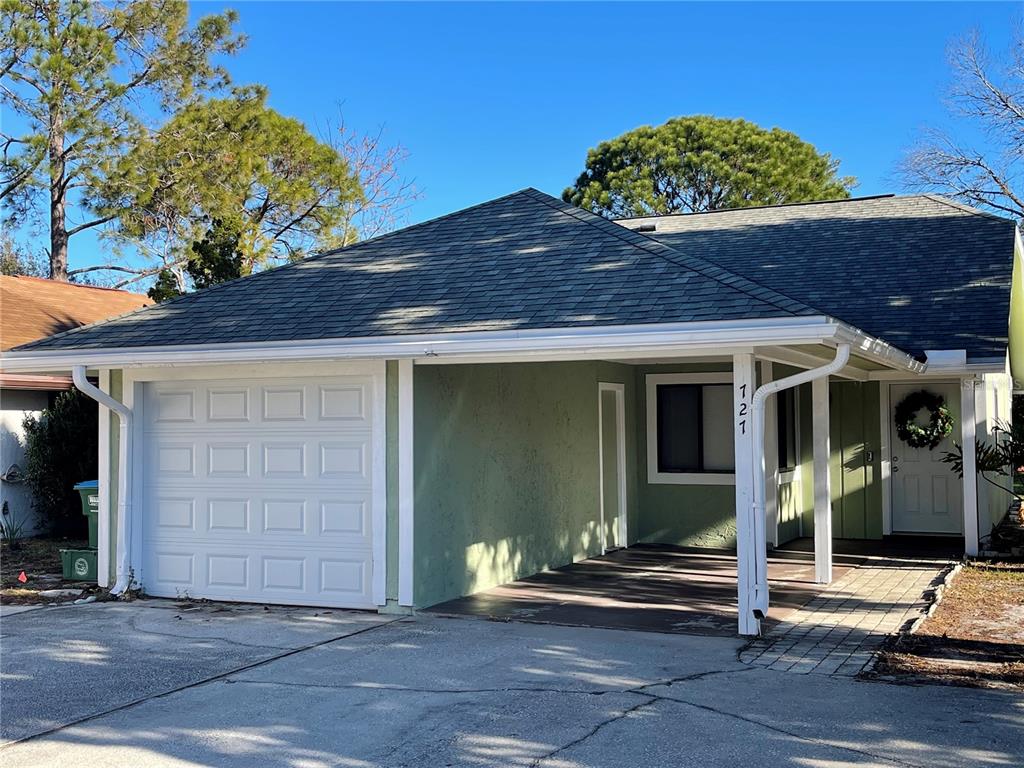 727 Ridgewood Way Winter Springs, FL 32708 - Photo 1 of 1 a front view of a house with garden