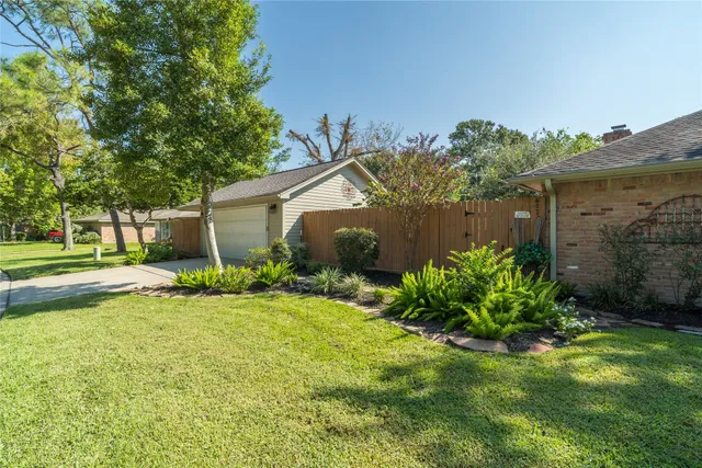 a view of a chairs and table in patio