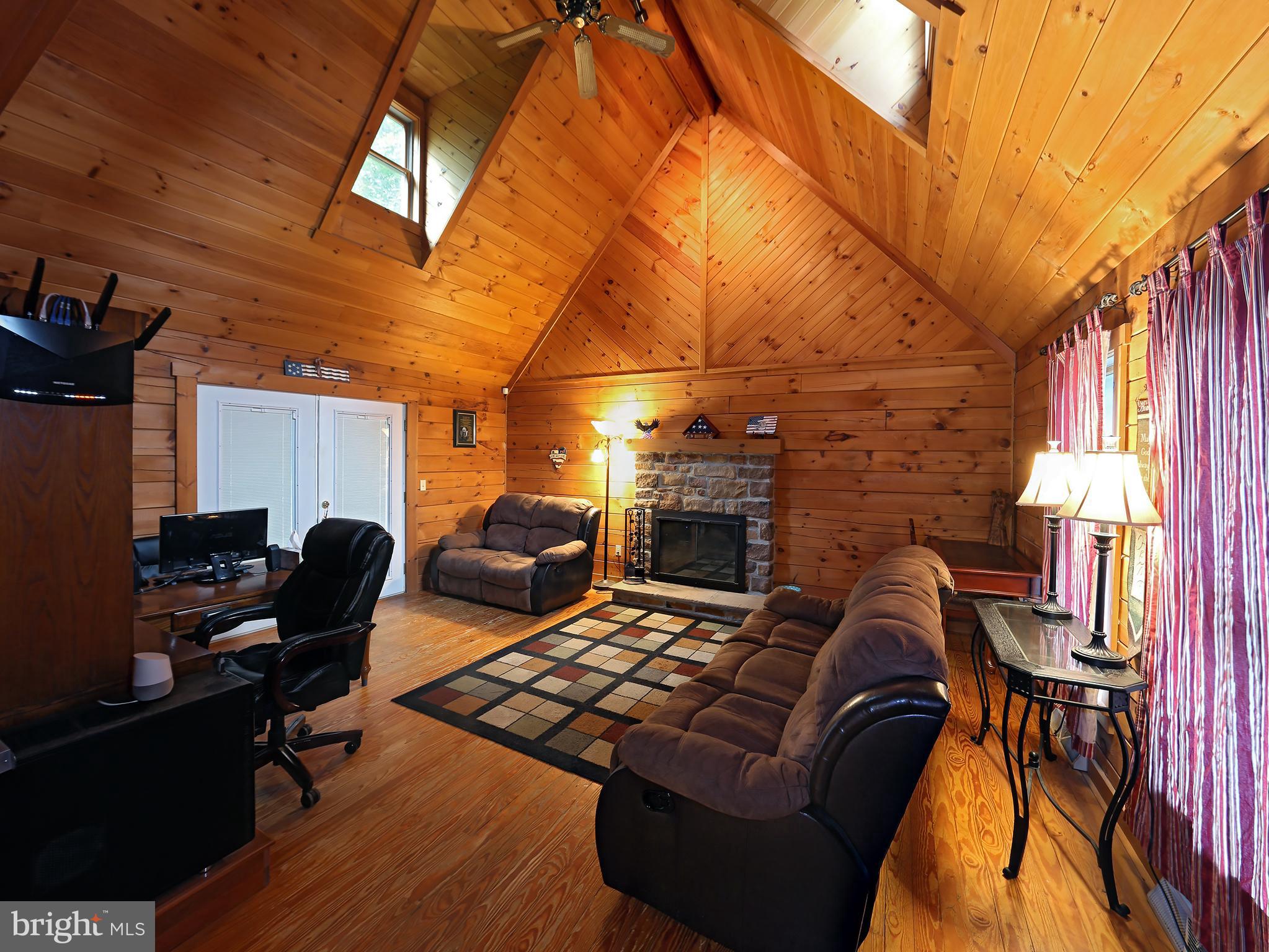 1093 Cider Press Road Manheim, PA 17545 - Photo 8 of 27 Family Room w/ Vaulted Ceilings & Fireplace