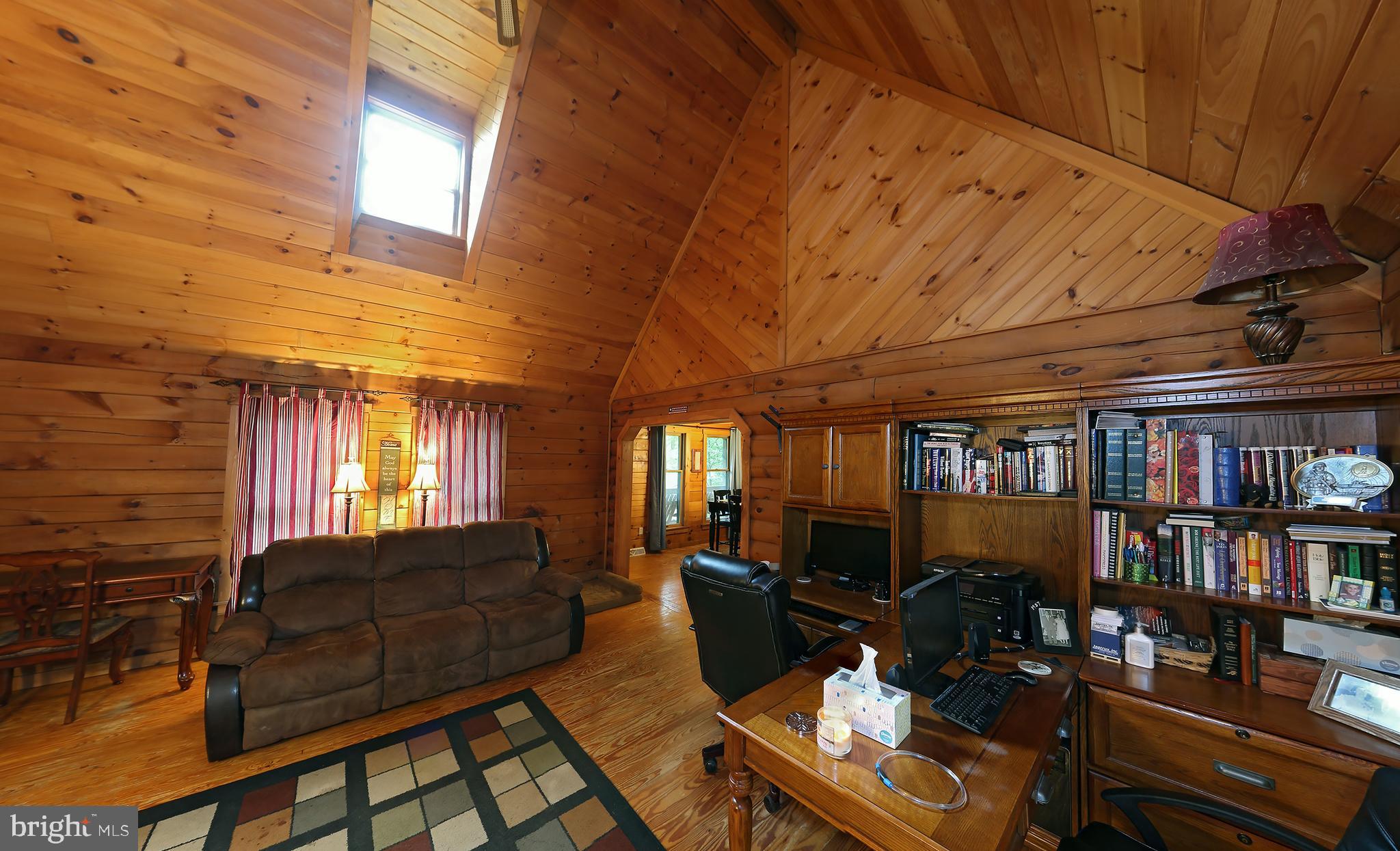1093 Cider Press Road Manheim, PA 17545 - Photo 9 of 27 Family Room w/ Vaulted Ceilings & Fireplace
