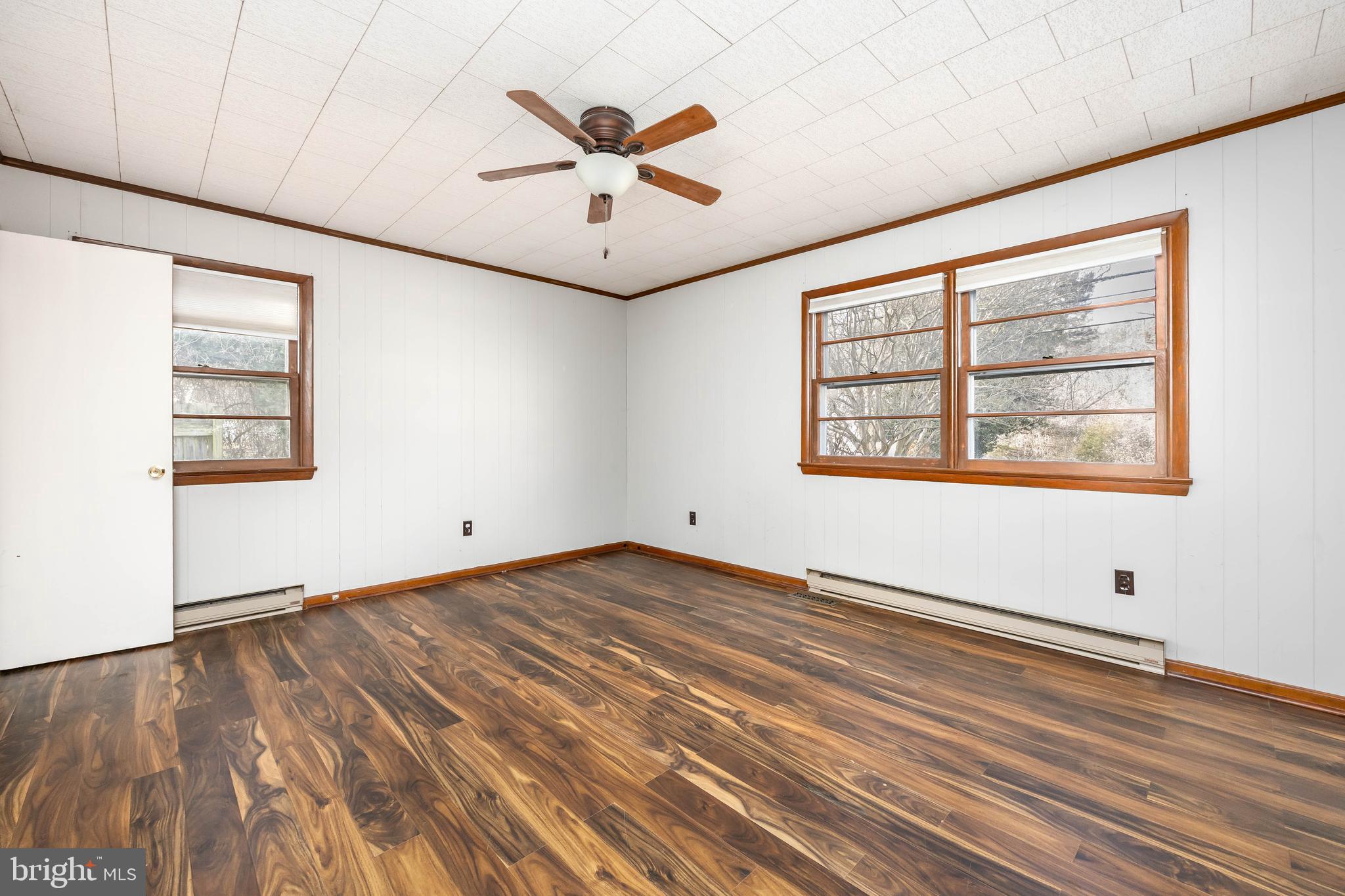 310 Zion Road Salisbury, MD 21804 - Photo 26 of 40 wooden floor in an empty room with a window
