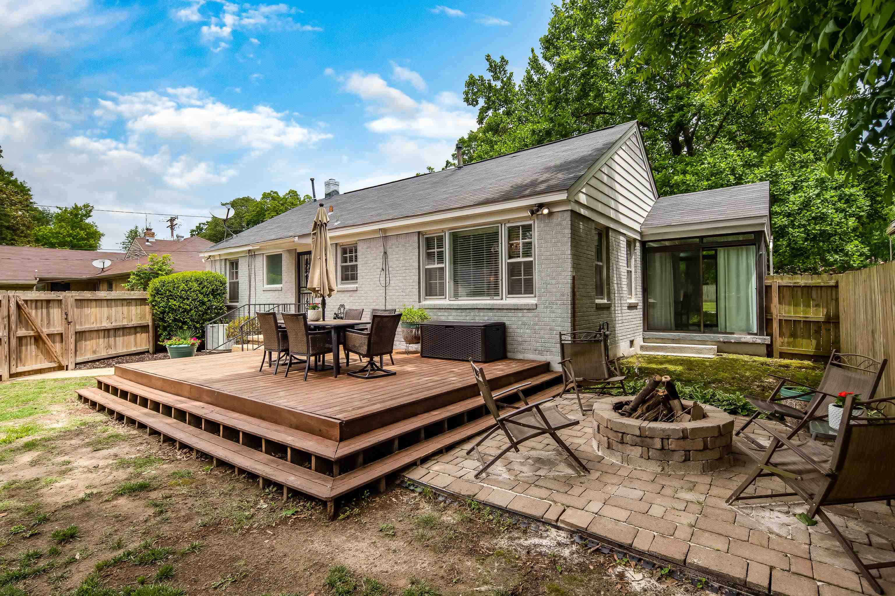 1157 Colonial Road Memphis, TN 38117 - Photo 18 of 25 a view of a house with patio and wooden floor