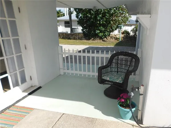 a view of entryway with wooden floor