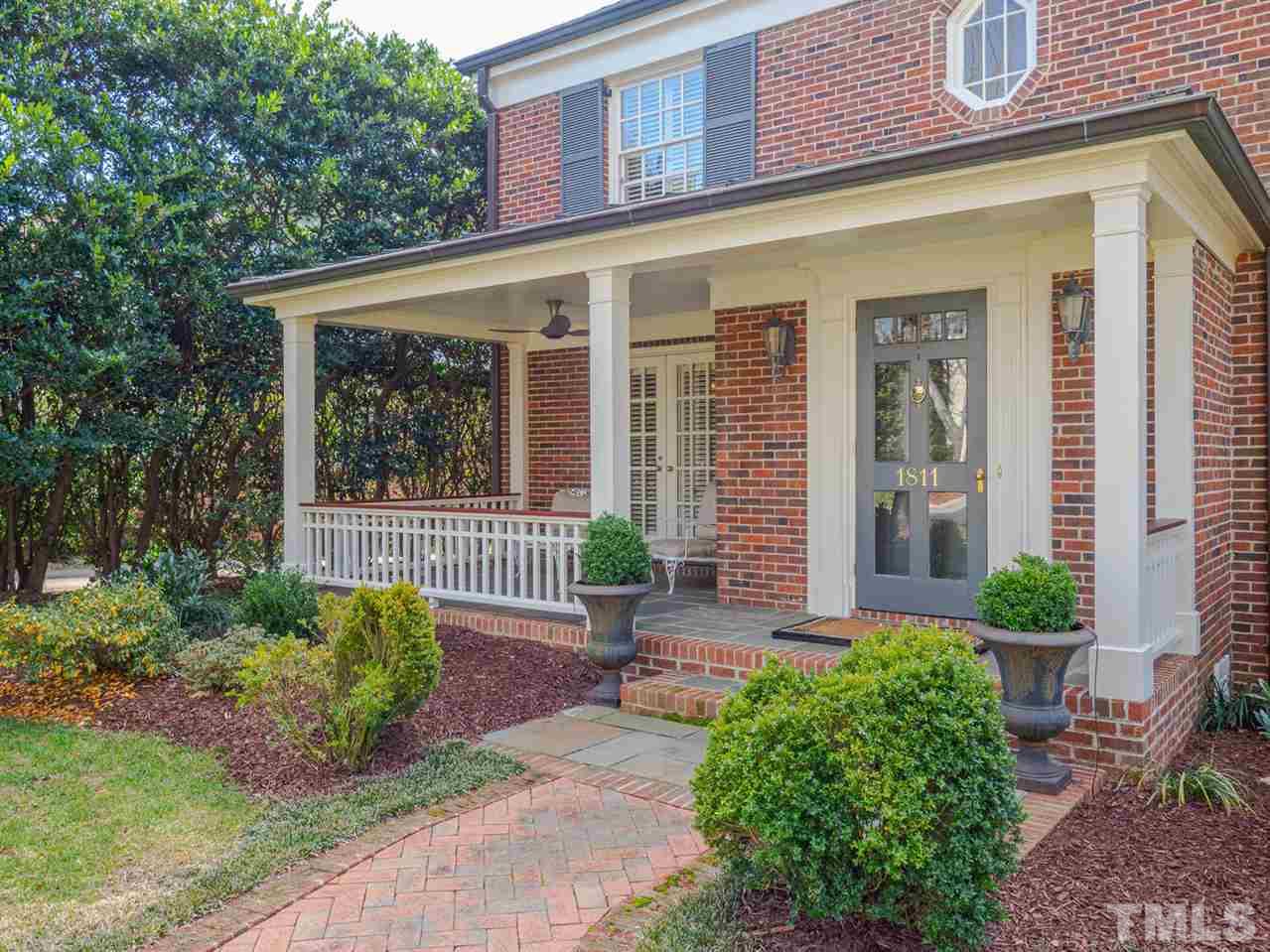 1811 Craig Street Raleigh, NC 27608 - Photo 2 of 28 front view of a house with a small yard