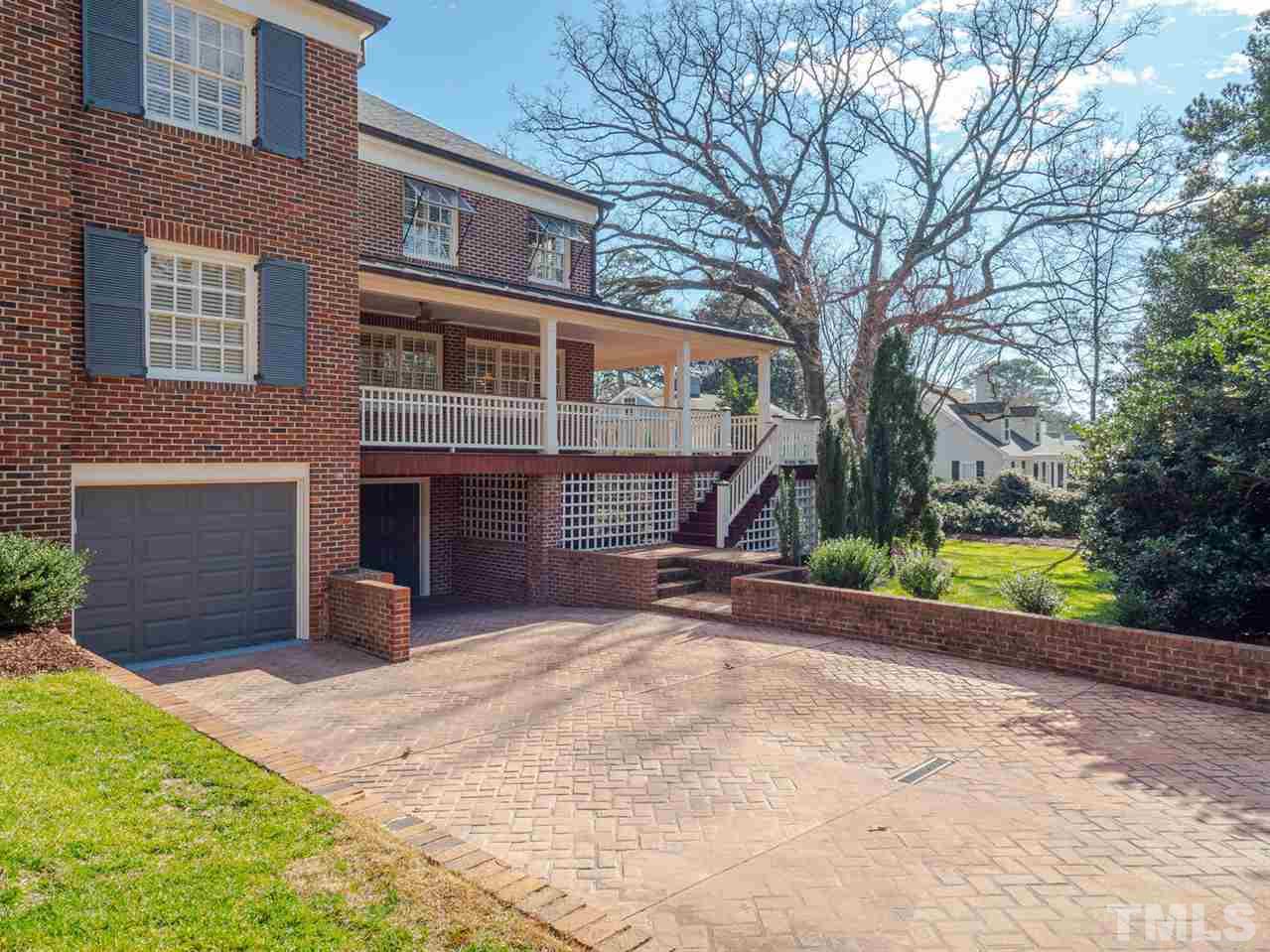 1811 Craig Street Raleigh, NC 27608 - Photo 20 of 28 a view of a house with a yard