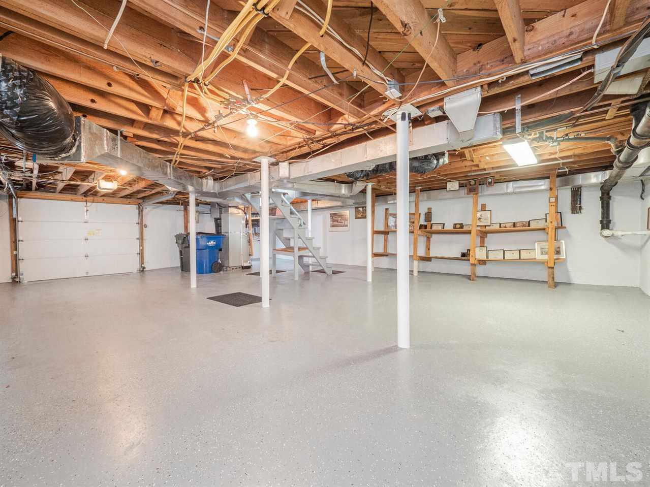 1811 Craig Street Raleigh, NC 27608 - Photo 22 of 28 a view of a room with wooden racks