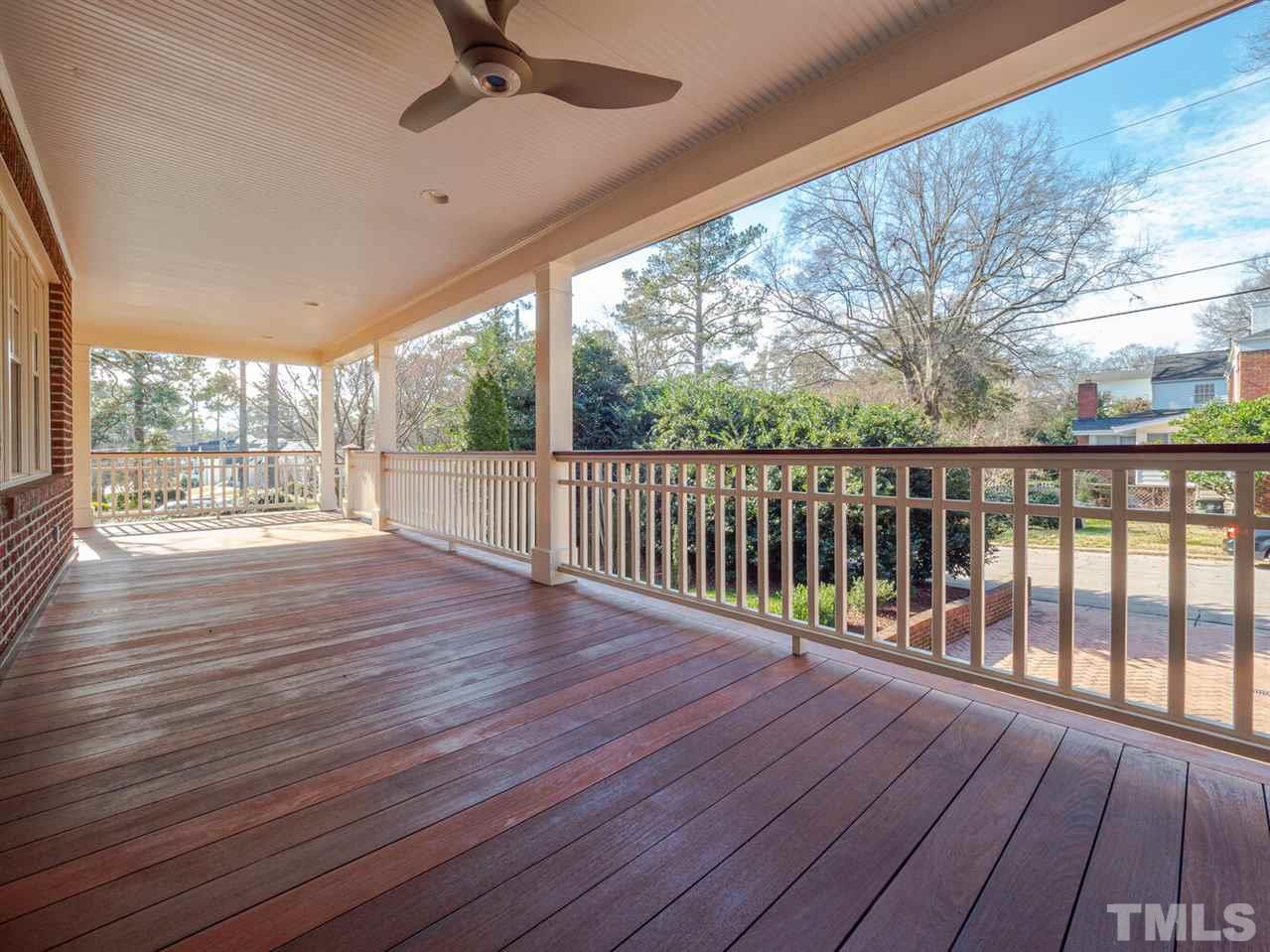 1811 Craig Street Raleigh, NC 27608 - Photo 23 of 28 a balcony with wooden floor