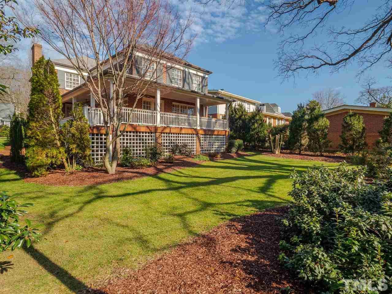 1811 Craig Street Raleigh, NC 27608 - Photo 26 of 28 a view of a big yard with a large trees