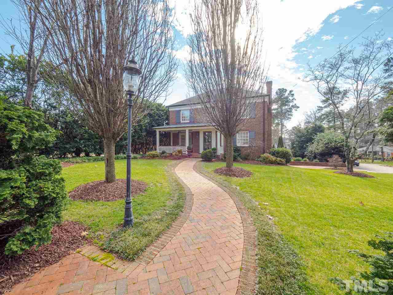 1811 Craig Street Raleigh, NC 27608 - Photo 28 of 28 a view of a house with a yard