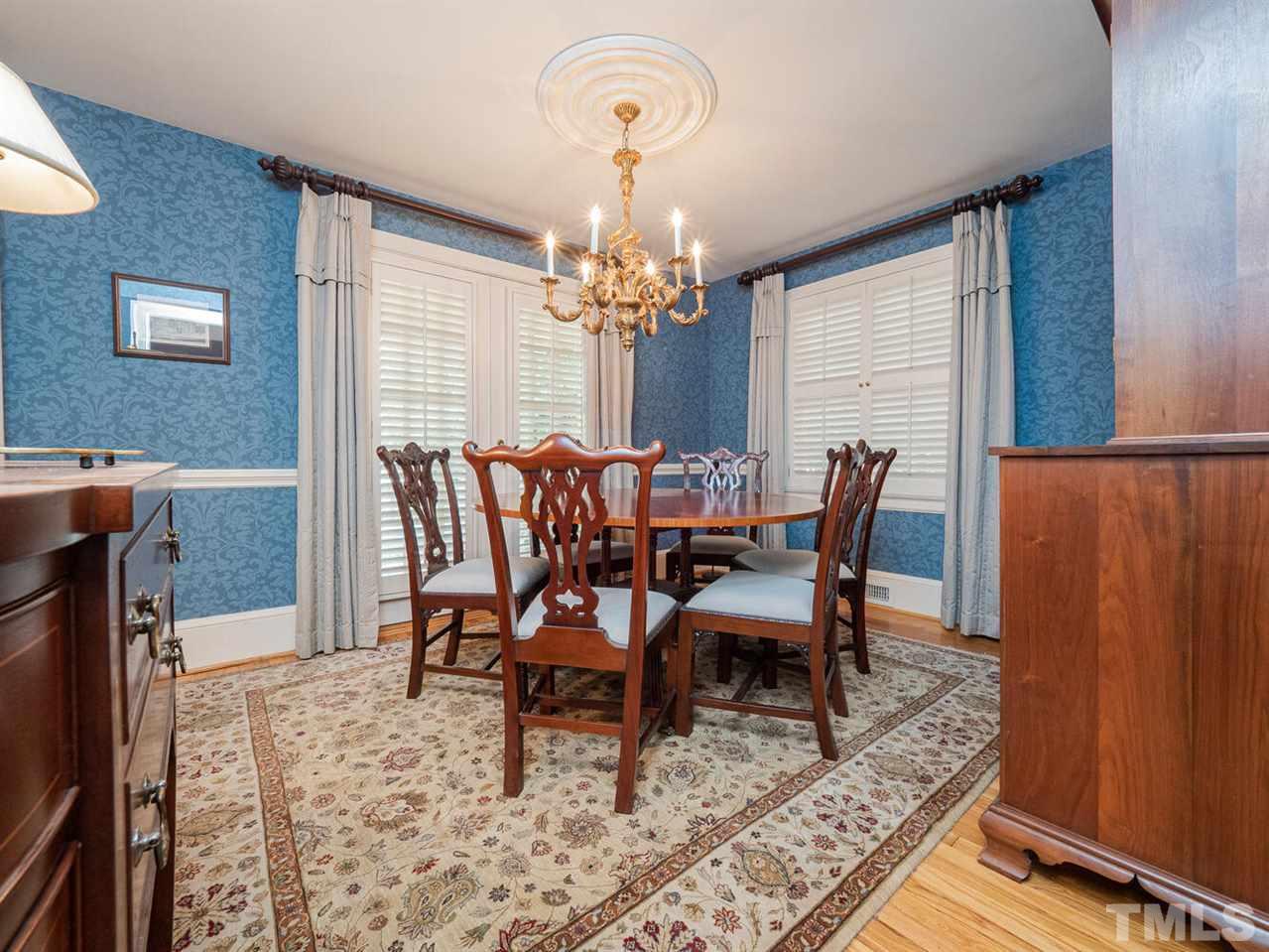 1811 Craig Street Raleigh, NC 27608 - Photo 5 of 28 a view of a dining room with furniture and window