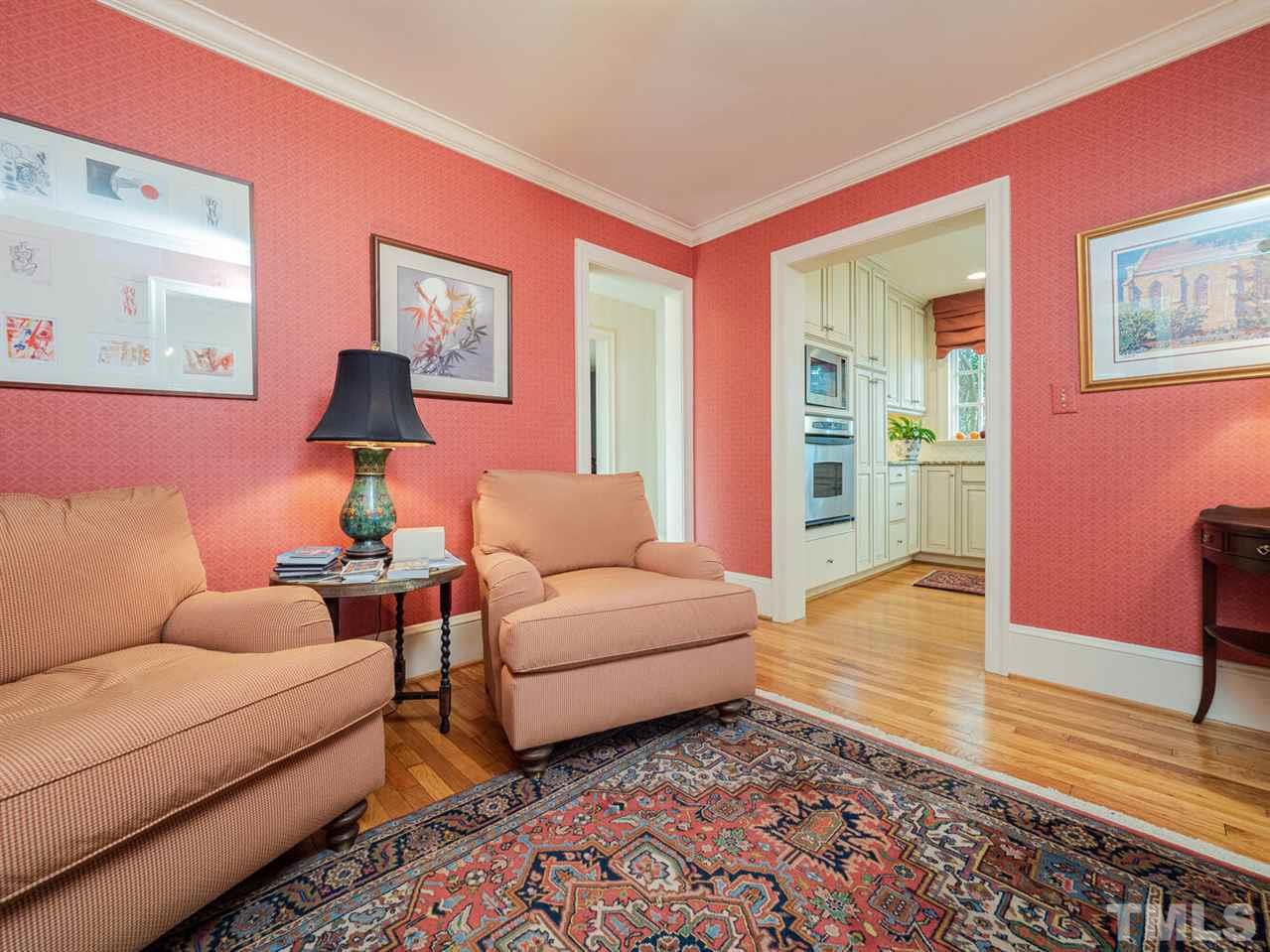 1811 Craig Street Raleigh, NC 27608 - Photo 9 of 28 a living room with furniture and a wooden floor
