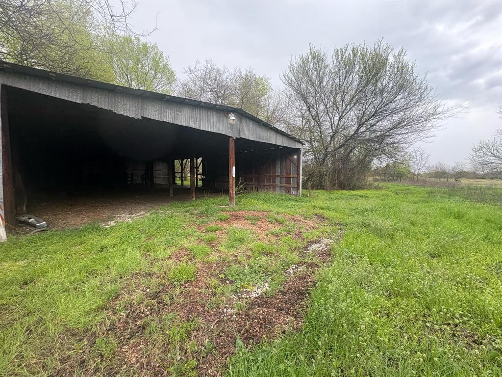 2998 County Road 658 Farmersville, TX 75442 - Photo 13 of 26 a backyard of a house with lots of green space
