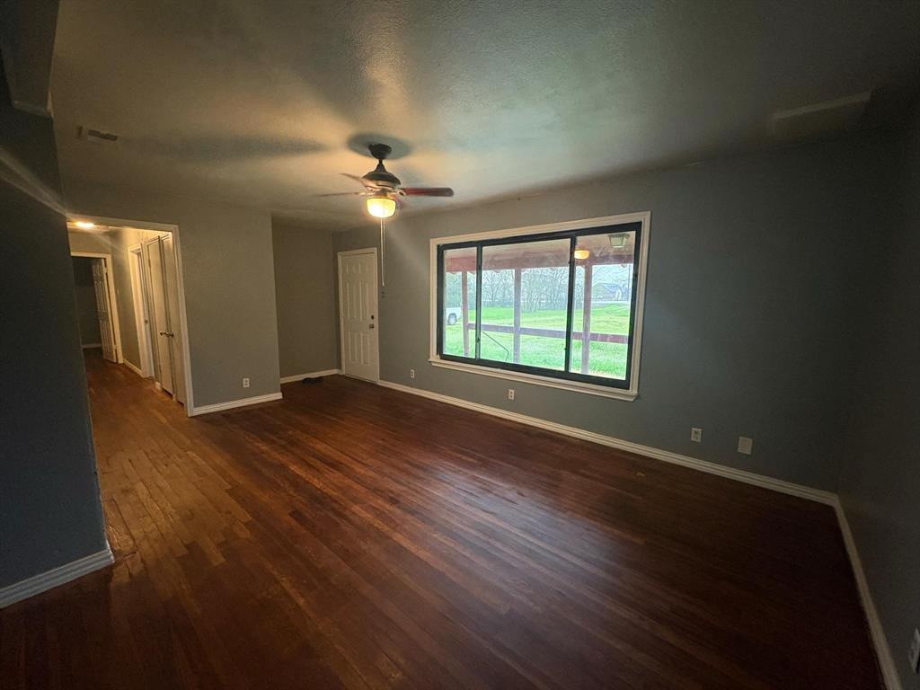 2998 County Road 658 Farmersville, TX 75442 - Photo 2 of 26 a view of an empty room with a window
