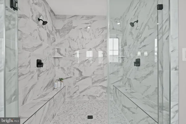 a kitchen with a dining table and chairs