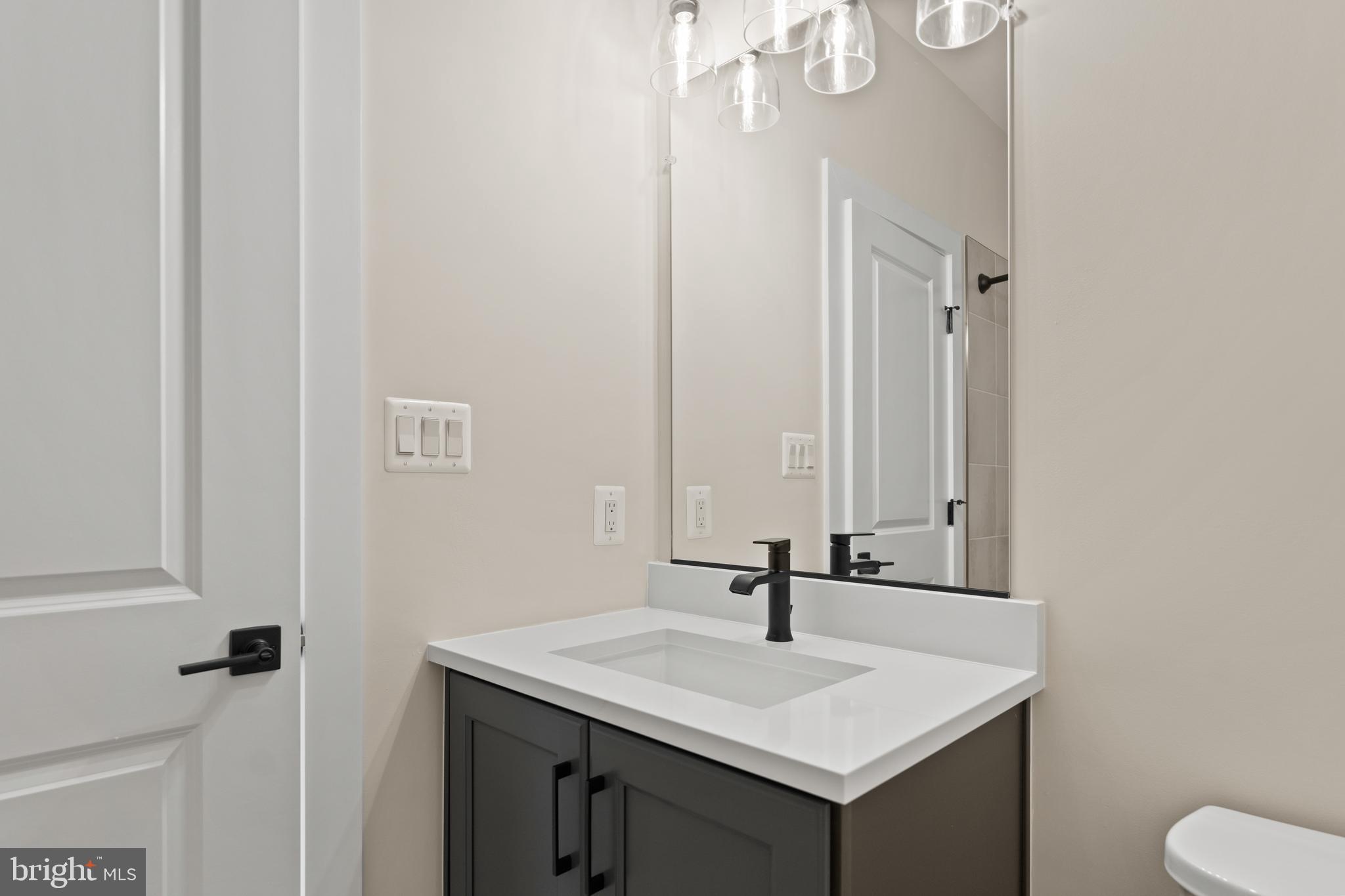 21331 Big Woods Road Dickerson, MD 20842 - Photo 46 of 79 a bathroom with a sink and a mirror