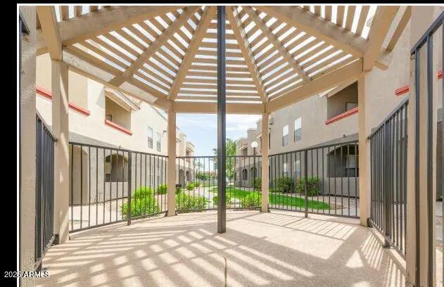 5740 North 59th Avenue, Unit 1B Glendale, AZ 85301 - Photo 6 of 10 a view of porch with a backyard
