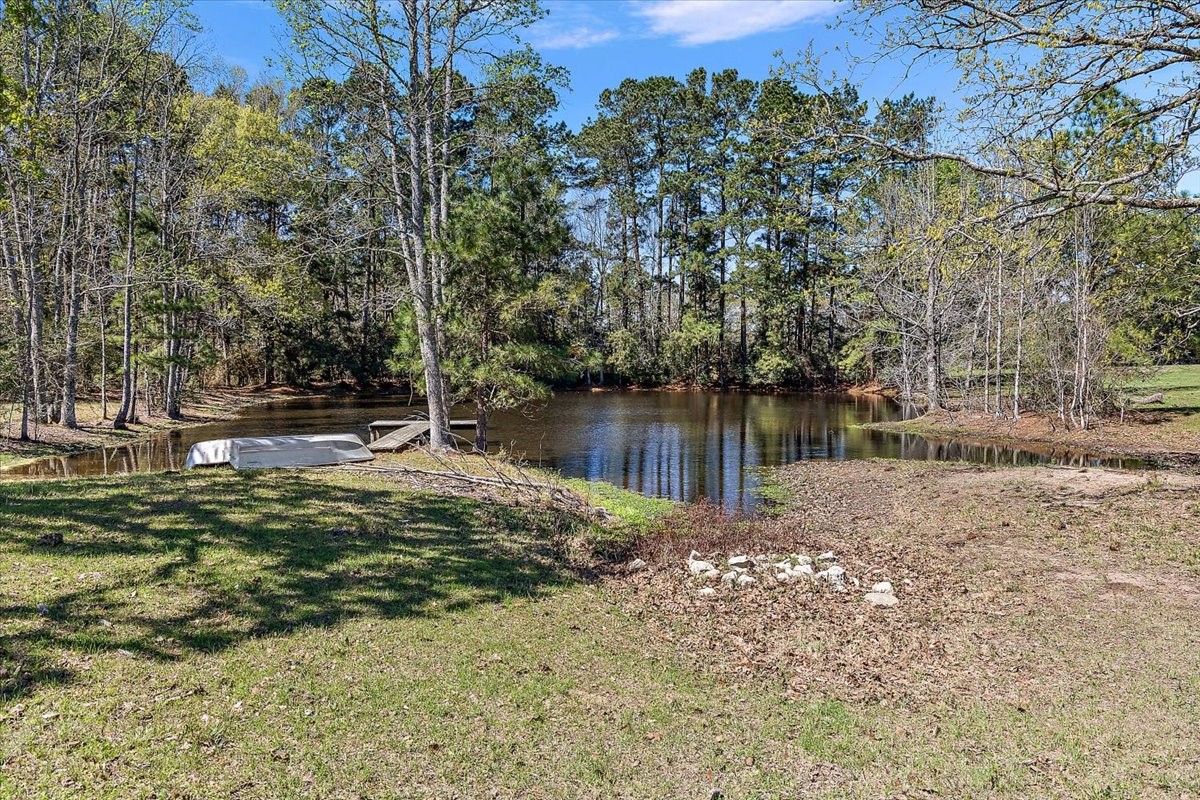 394 Farm To Market 230 Trinity, TX 75862 - Photo 2 of 50 a view of a lake with houses