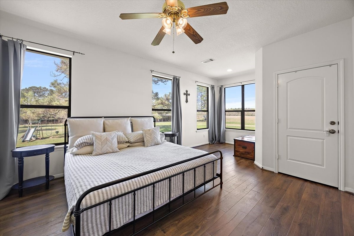 394 Farm To Market 230 Trinity, TX 75862 - Photo 21 of 50 a bedroom with a bed and a window
