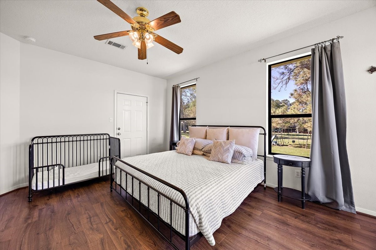 394 Farm To Market 230 Trinity, TX 75862 - Photo 22 of 50 a bedroom with a bed and a window