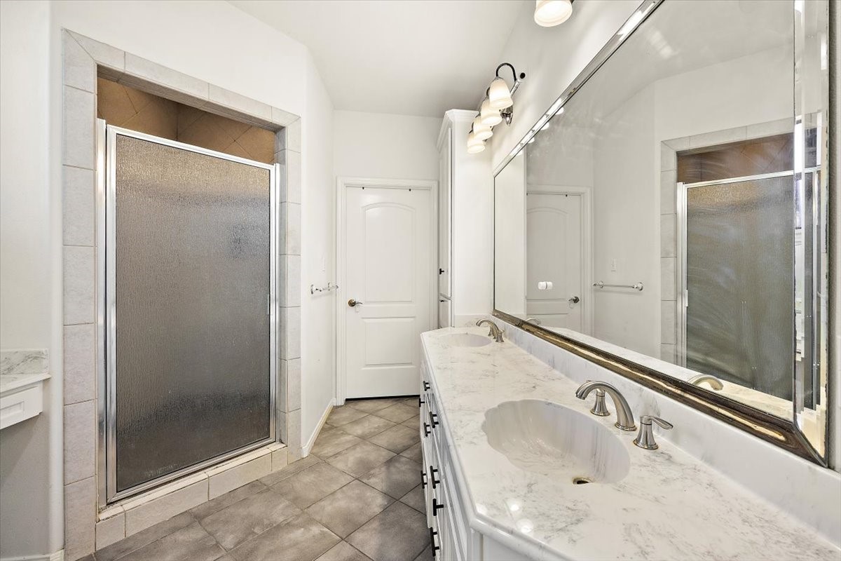 394 Farm To Market 230 Trinity, TX 75862 - Photo 26 of 50 a bathroom with a tub sink and mirror