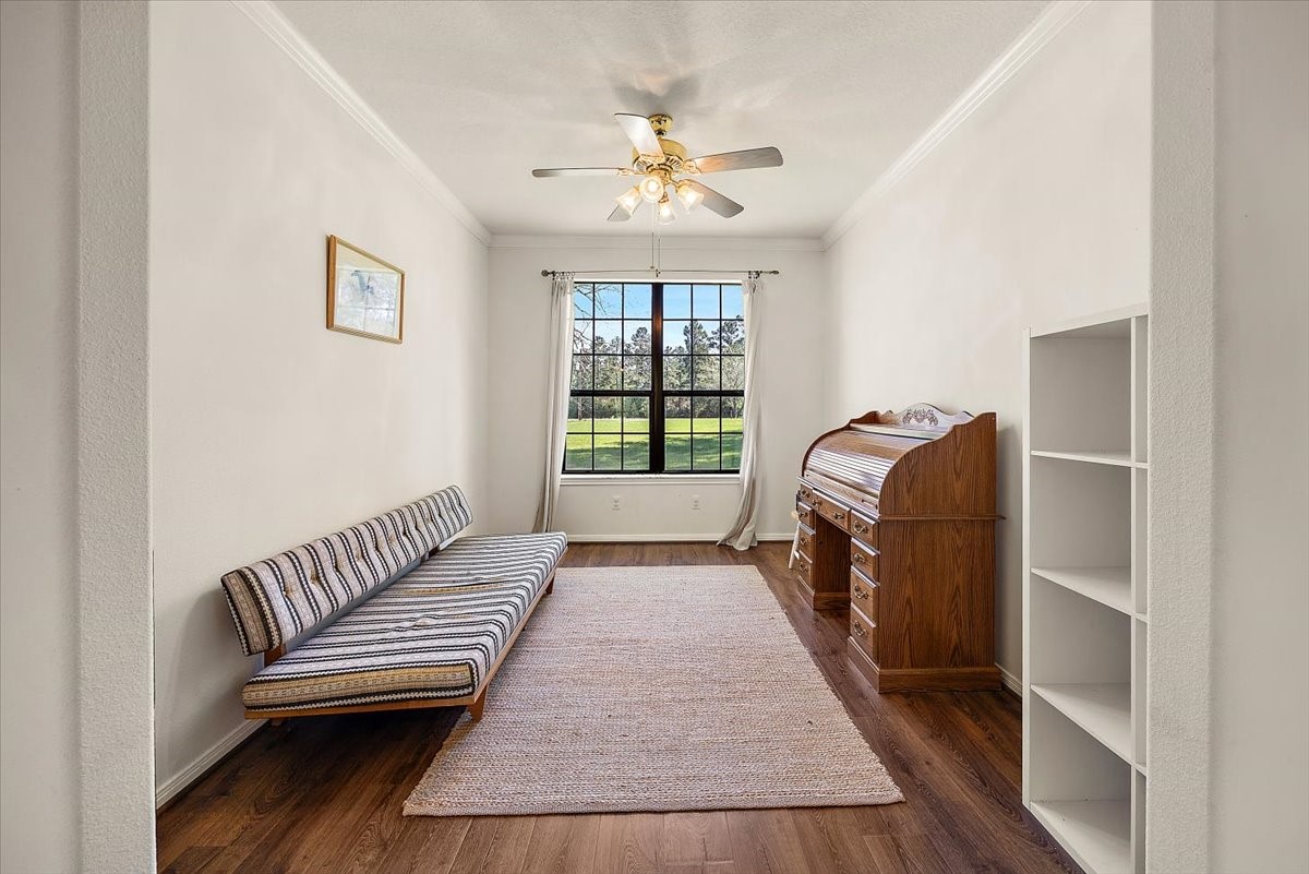394 Farm To Market 230 Trinity, TX 75862 - Photo 33 of 50 a living room with a balcony furniture and a chandelier
