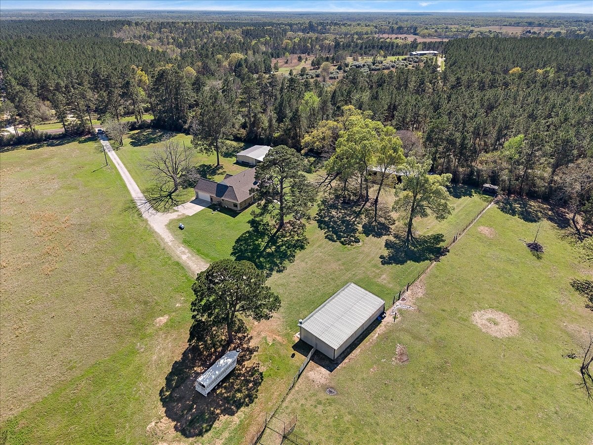 394 Farm To Market 230 Trinity, TX 75862 - Photo 48 of 50 an aerial view of a house with a yard