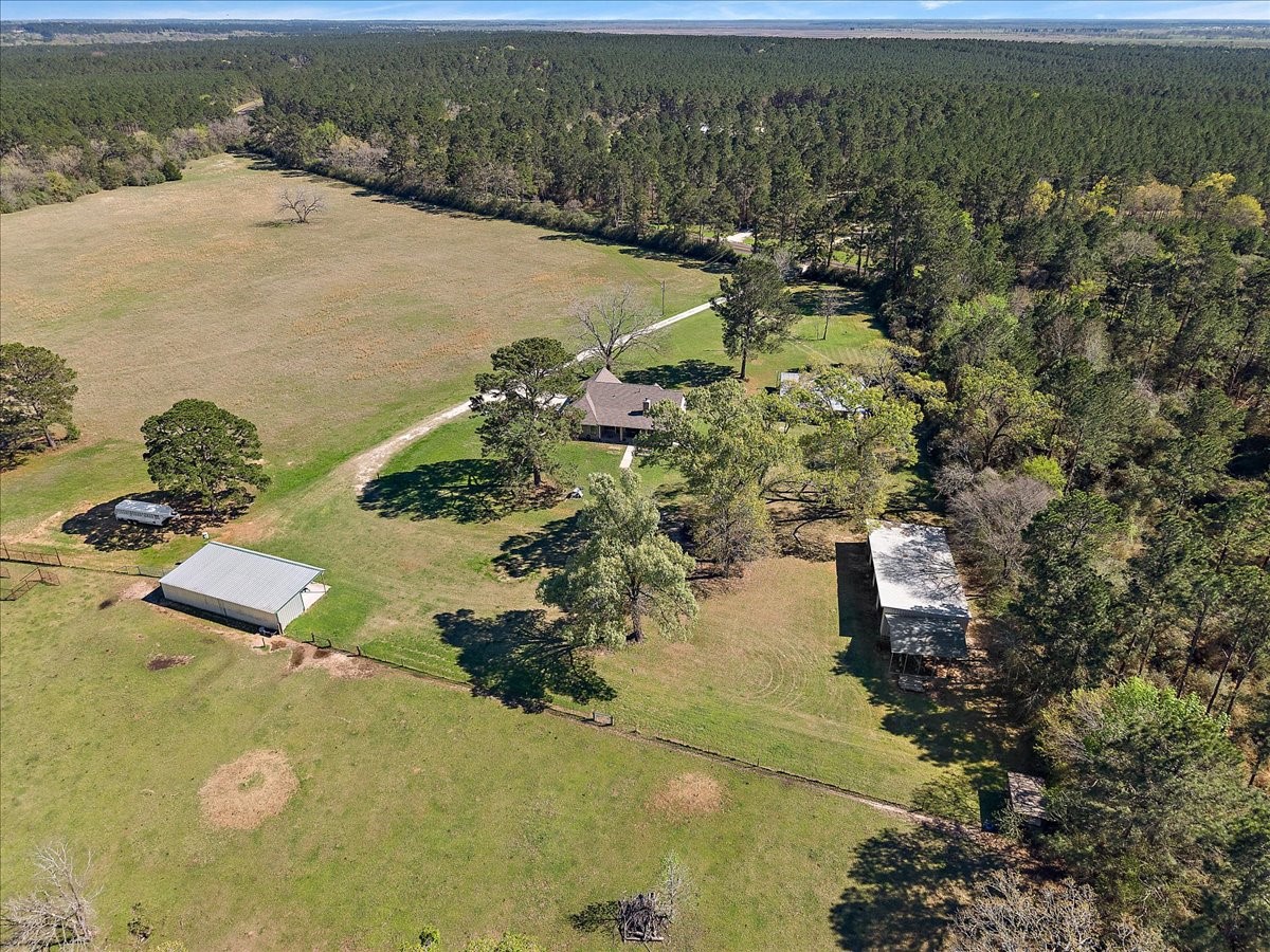 394 Farm To Market 230 Trinity, TX 75862 - Photo 49 of 50 an aerial view of a house with a yard