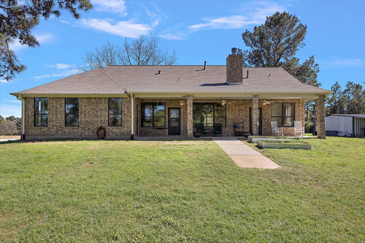 394 Farm To Market 230 Trinity, TX 75862 - Photo 8 of 50 front view of a house with a yard