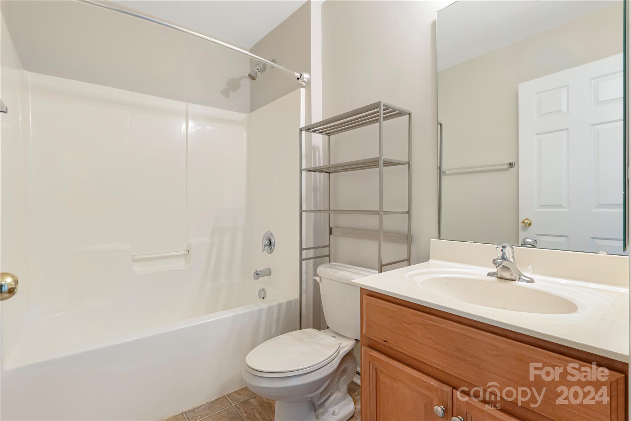 175 Snead Road Fort Mill, SC 29715 - Photo 21 of 26 a bathroom with a sink toilet and shower