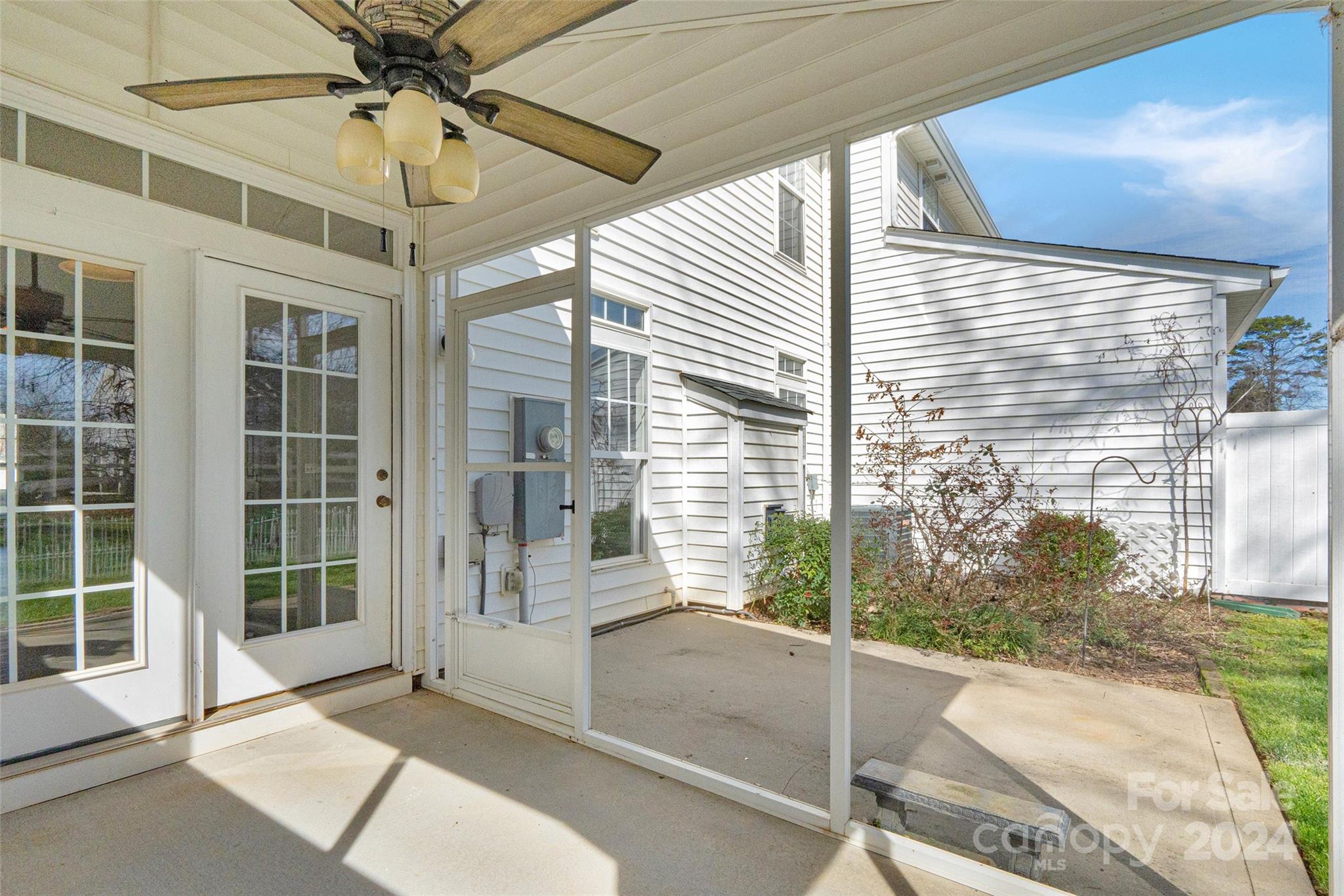 175 Snead Road Fort Mill, SC 29715 - Photo 24 of 26 a view of a porch with a table and chairs