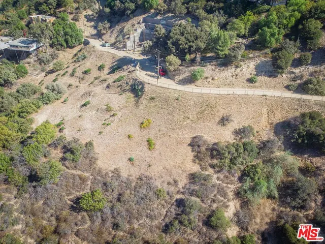 an aerial view of residential house and outdoor space