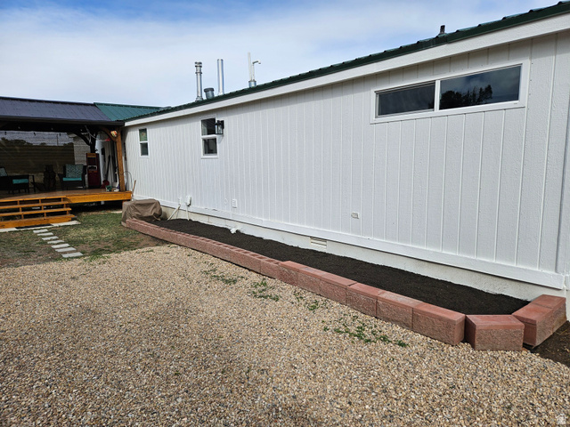 36652 Highway 40 Duchesne, UT 84021 - Photo 3 of 33 View of side of property featuring a wooden deck