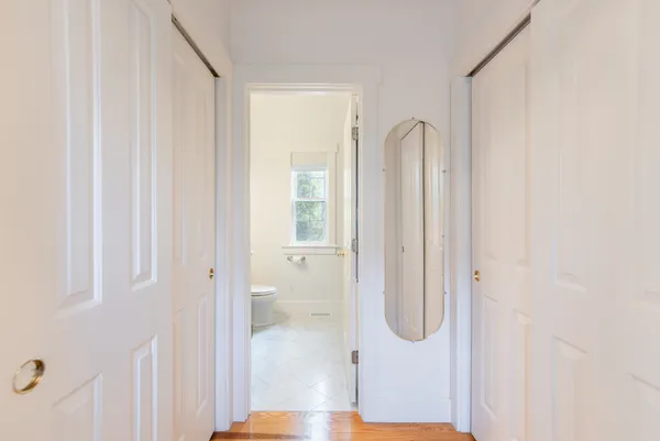 a bathroom with a glass shower door