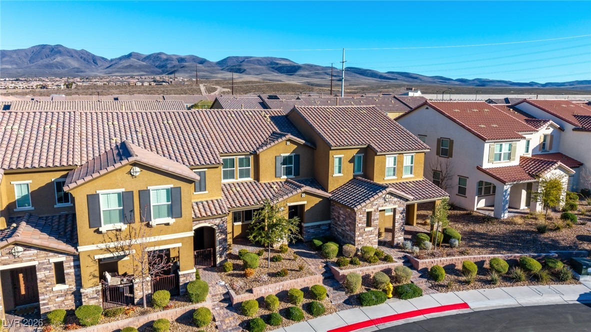 2862 Turnstone Ridge Street Henderson, NV 89044 - Photo 29 of 30 Aerial perspective of suburban area with mountains