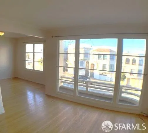 a view of an empty room with a window