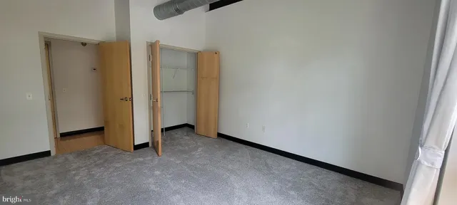 an empty room with closet