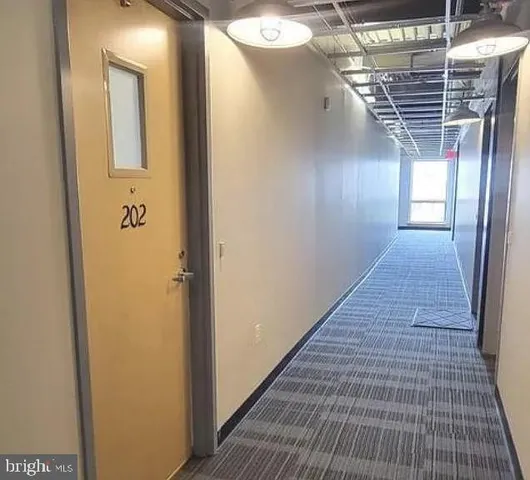 a kitchen with a sink and a stove