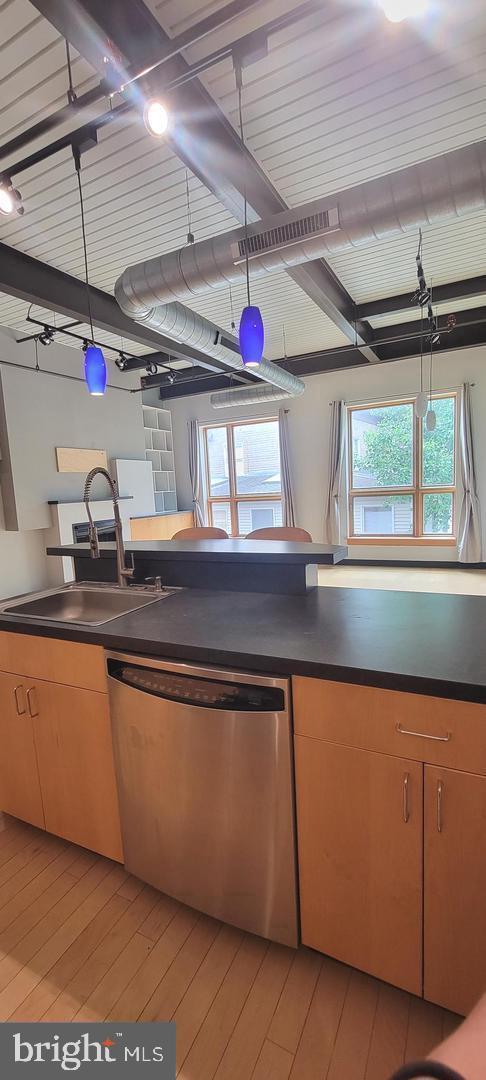 75 Maple Street, Unit 202 Conshohocken, PA 19428 - Photo 16 of 36 a kitchen with a sink and a stove