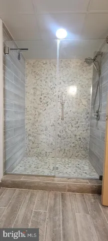 a bathroom with a bath tub