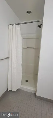 a view of a hallway with windows